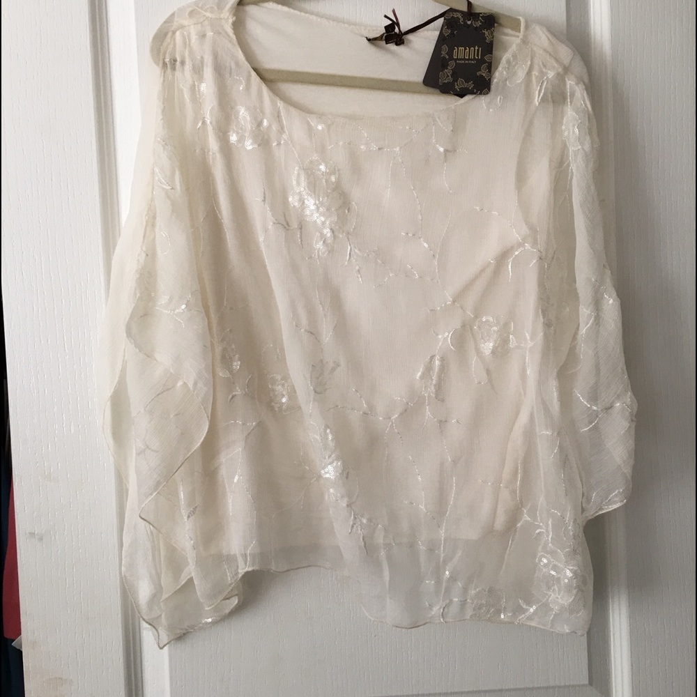 Silk Chifon with flower embroidery with Sequins.